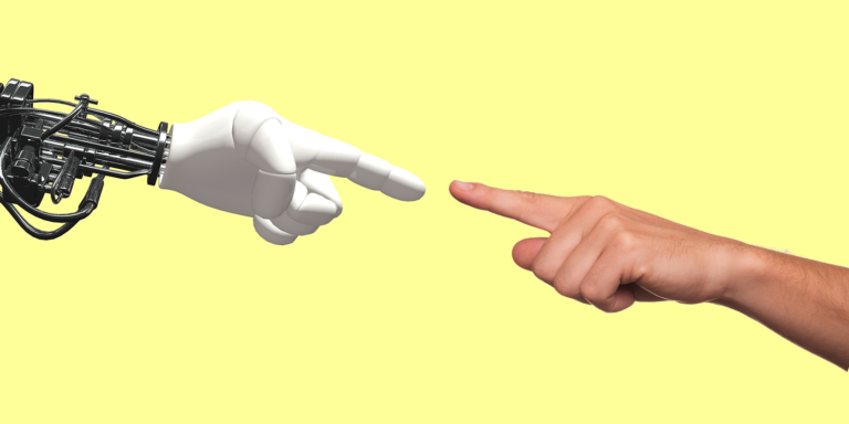 A robot hand points at a human hand against a yellow background.
