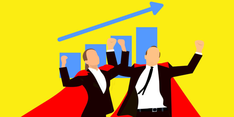 Two business men in red capes throw their arms up as a blue bar graph with a rising arrow is behind them.