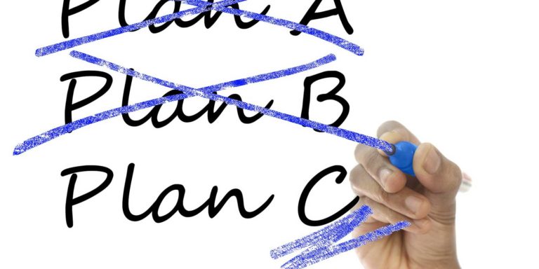Plan A, Plan B, and Plan C written out and stacked on top of each other, with plans A and B crossed out.