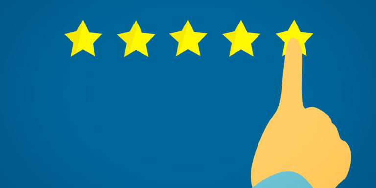 Five gold stars on a blue background with a hand pointing to the star on the very left.
