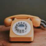 A retro orange phone.