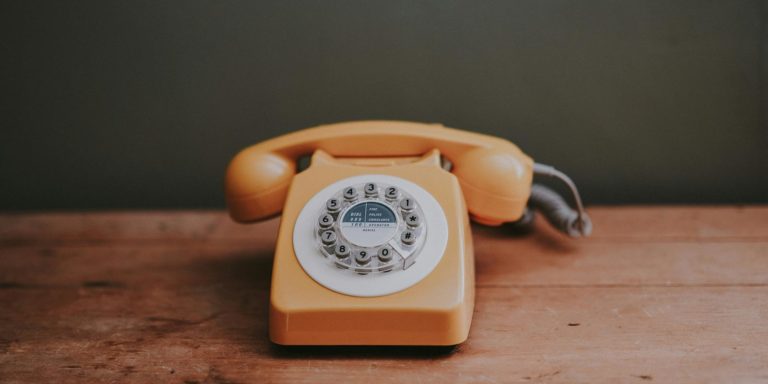 A retro orange phone.